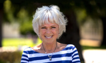 Byron Katie author stripe shirt