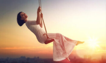 Robin Silverman girl swing sunset